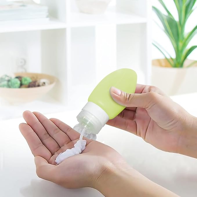 Dot&Dot Leak Proof Toiletry Bottles - 4 Pack Silicone Travel Bottles - Shampoo & Conditioner Container with TSA Quart Bag - 1 oz