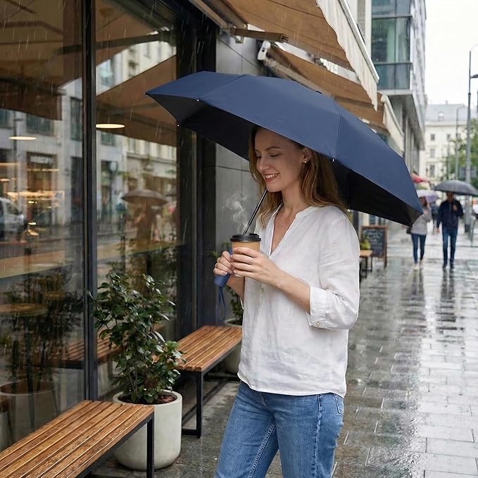 BAODINI Small UV Protection Travel Umbrella Compact for Rain and Sun UPF 50+ Windproof Portable 42 inch Umbrella for Women and Men