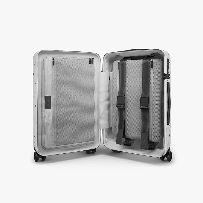Monos Carry-On Pro Plus Luggage (23"), Hardside Spinner Suitcase with TSA Lock & Front Pocket, Airline Approved, Terrazzo, White