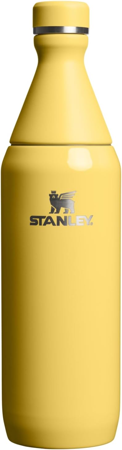 Stanley All Day Slim Bottle 20 oz | Twist On Lid with Leakproof Seal | Slim Design for Travel & Gym | Insulated Stainless Steel | BPA-Free | Daffodil Gloss