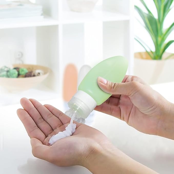Dot&Dot Leak Proof Travel Bottles for Toiletries - 4 Pack Silicone Toiletry Containers - Shampoo and Conditioner Bottles TSA Quart Bag - 2 oz Size