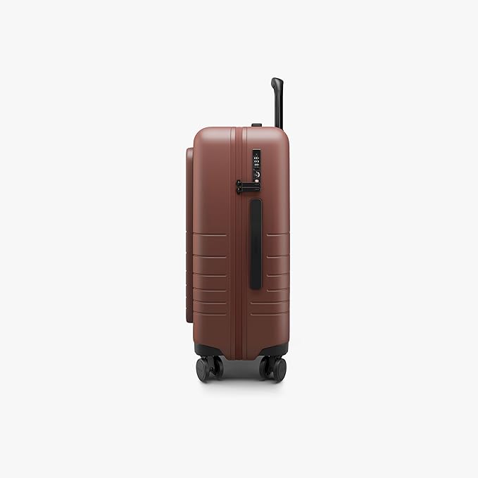 Monos Carry-On Pro Plus Luggage (23"), Hardside Spinner Suitcase with TSA Lock & Front Pocket, Airline Approved, Terracotta, Red