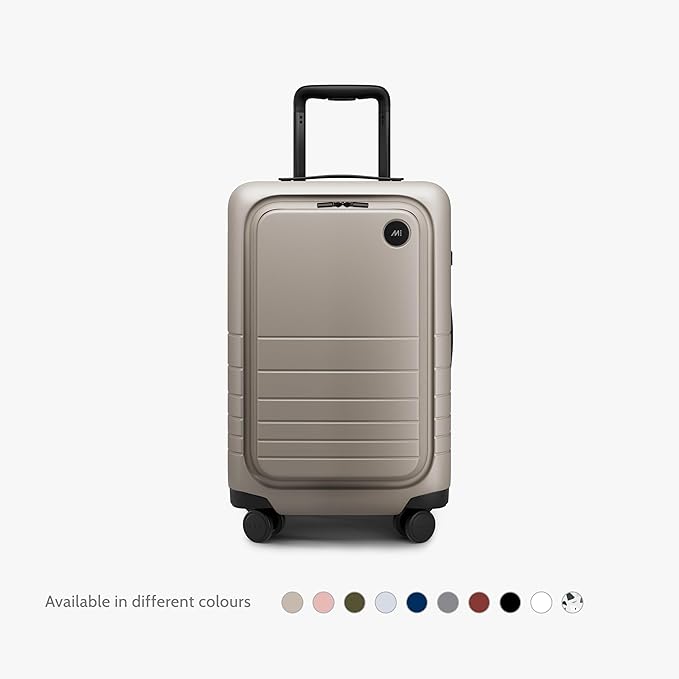 Monos Carry-On Pro Plus Luggage (23"), Hardside Spinner Suitcase with TSA Lock & Front Pocket, Airline Approved, Desert Taupe, Beige