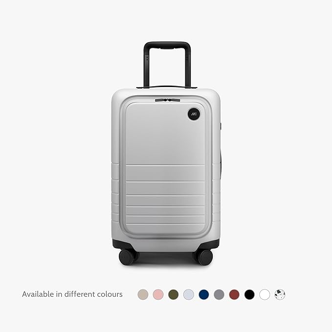 Monos Carry-On Pro Plus Luggage (23"), Hardside Spinner Suitcase with TSA Lock & Front Pocket, Airline Approved, Stellar White