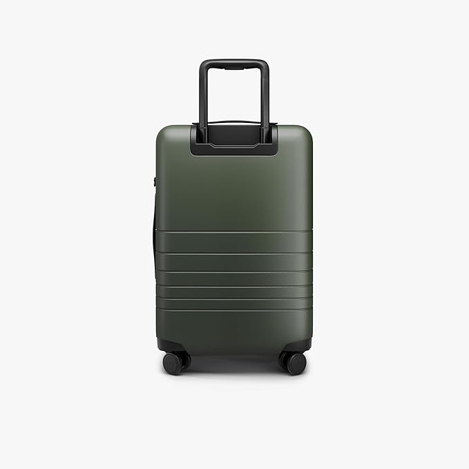 Monos Carry-On Pro Plus Luggage (23"), Hardside Spinner Suitcase with TSA Lock & Front Pocket, Airline Approved, Olive Green