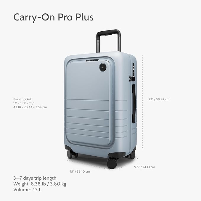 Monos Carry-On Pro Plus Luggage (23"), Hardside Spinner Suitcase with TSA Lock & Front Pocket, Airline Approved, Blue Haze