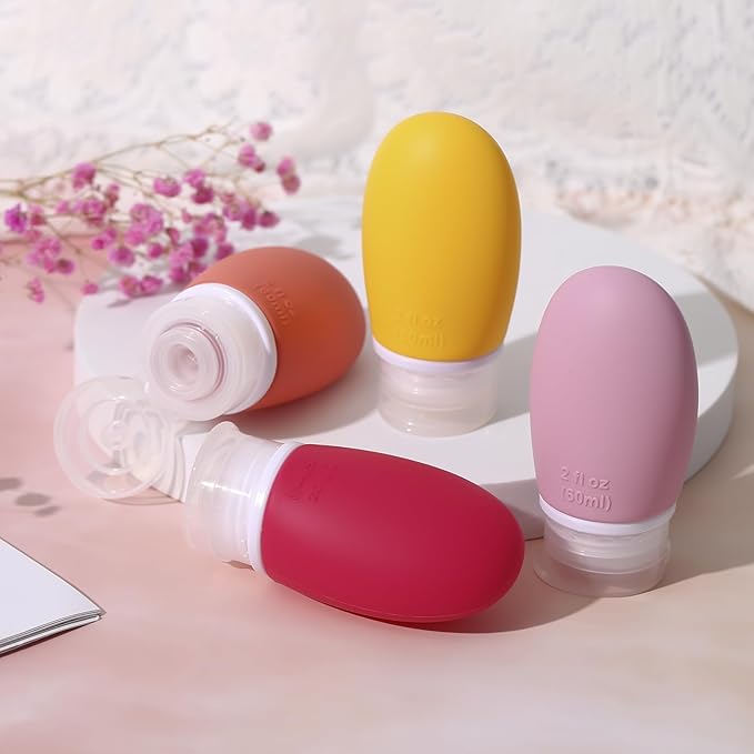 Leak Proof Silicone Travel Bottles,4 Pack 2oz Liquid Squeezable Refillable Portable Accessories/Cosmetic Containers,BPA Free,Travel Size Bottles for Toiletries Shampoo Conditioner Lotion