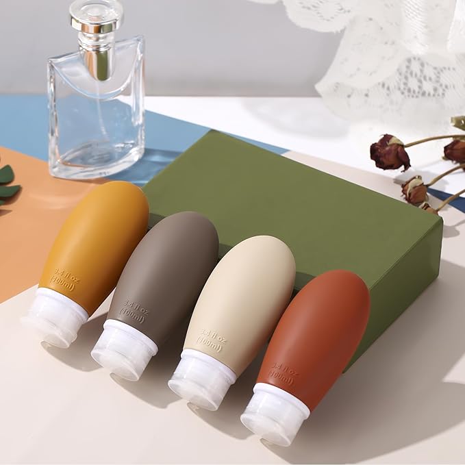 Leak Proof Silicone Travel Bottles,4 Pack 3.4oz Liquid Squeezable Refillable Portable Accessories/Cosmetic Containers,BPA Free,Travel Size Bottles for Toiletries Shampoo Conditioner Lotion(Brown)