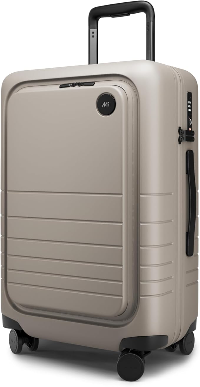 Monos Carry-On Pro Plus Luggage (23"), Hardside Spinner Suitcase with TSA Lock & Front Pocket, Airline Approved, Desert Taupe, Beige