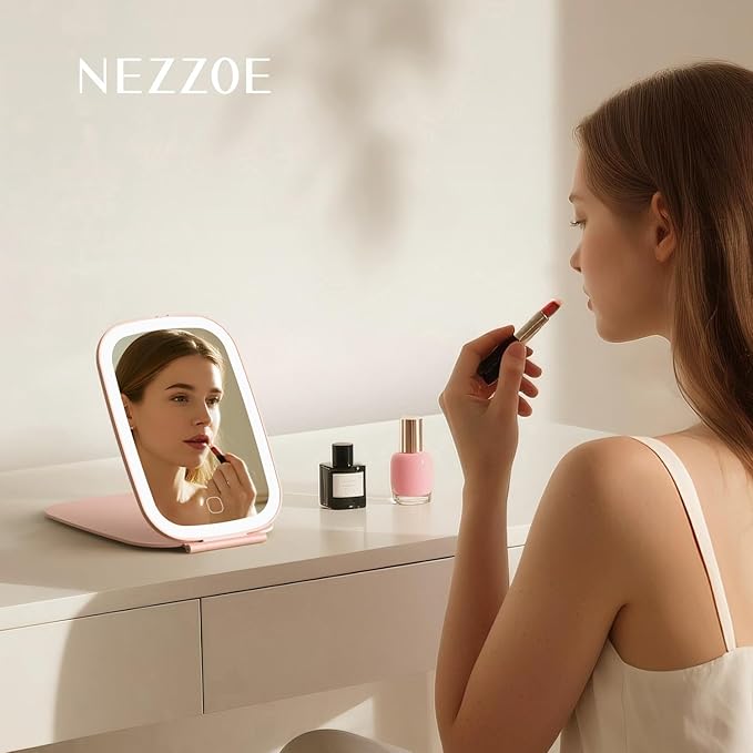 NEZZOE Rechargeable Travel Makeup Mirror with LED Light, 3 Lighting Modes, 7 x 5 Inch Foldable Vanity Mirror for Desk or On The Go, Pink