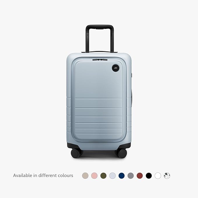 Monos Carry-On Pro Plus Luggage (23"), Hardside Spinner Suitcase with TSA Lock & Front Pocket, Airline Approved, Blue Haze