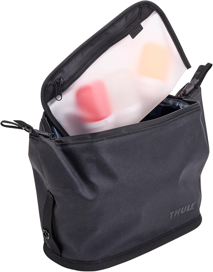 Thule Aion Toiletry Bag - Water-resistant bag for toiletries, makeup & shaving essentials - Removable liquids bag included - Easy to clean - Snap loop for easy hang - Waxed, PFC-free fabric
