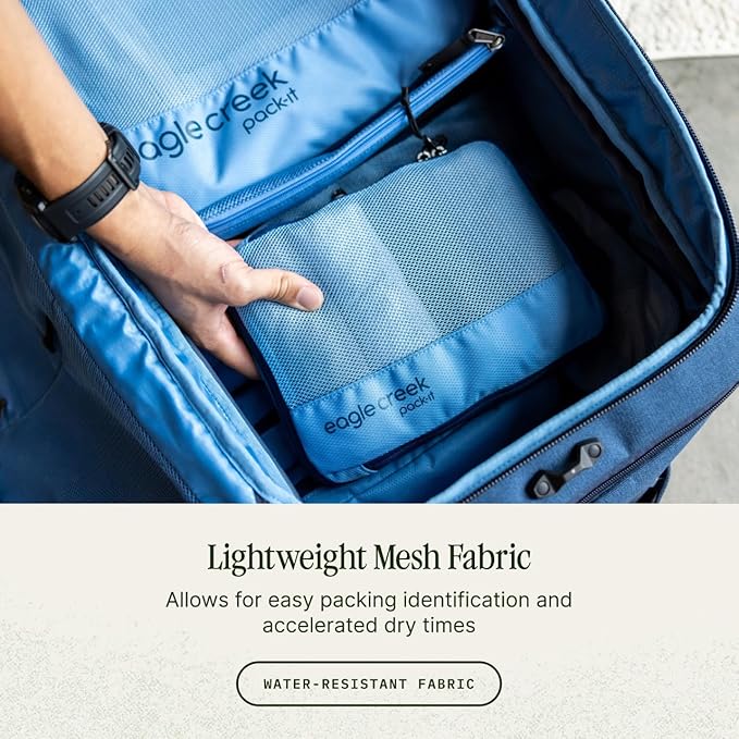 Eagle Creek Pack-It Reveal Cube - Lightweight Packing Cubes for Optimizing Luggage Space - Easy to Carry - Translucent Fabric - Water-Resistant - Easy Grab Zipper - Medium - Blue Dawn