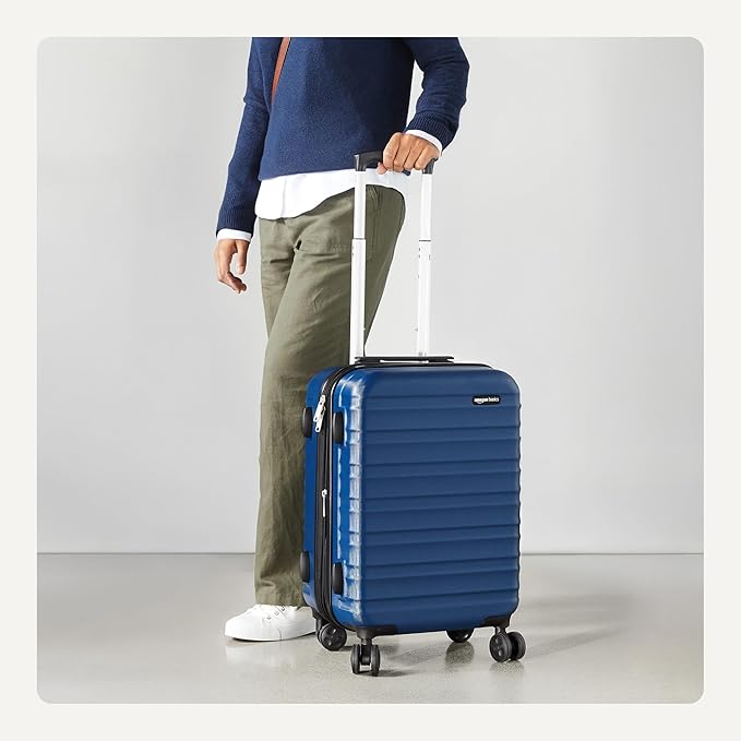 Amazon Basics 21" Hardside Carry-On Luggage with Multi-directional Wheels, Expandable for Up to 25% More Space, Scratch-Resistant Surface, Organized Interior, Navy Blue