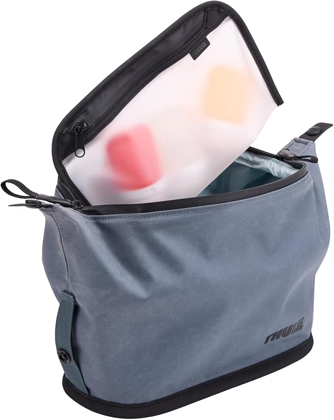 Thule Aion Toiletry Bag - Water-resistant bag for toiletries, makeup & shaving essentials - Removable liquids bag included - Easy to clean - Snap loop for easy hang - Waxed, PFC-free fabric