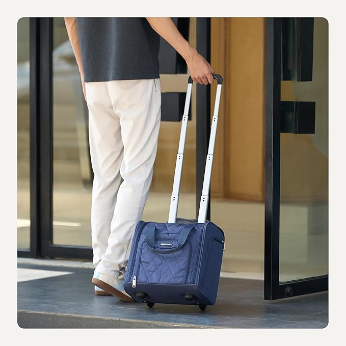 Amazon Basics Underseat Carry-On Luggage with Wheels, 14" Rolling Travel Bag, Fits Under the Seat with Multiple Pockets and Compartments, Navy Quilted