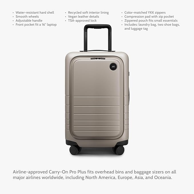 Monos Carry-On Pro Plus Luggage (23"), Hardside Spinner Suitcase with TSA Lock & Front Pocket, Airline Approved, Desert Taupe, Beige