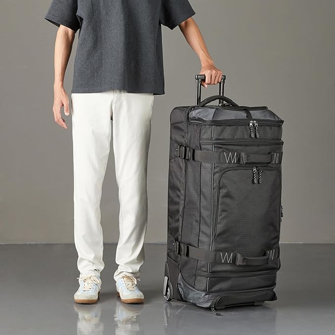 Amazon Basics 35-inch Large Rolling Duffel Bag with Wheels and Handle, Travel Duffle with Durable Ripstop Polyester Material, 2 Layers of Storage Space, Multiple Interior and Exterior Pockets, Black