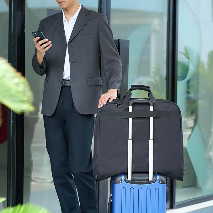 Amazon Basics 43" Travel Garment Bag Travel, Spacious Suit Bag with Detachable Shoulder Strap, Exterior/Interior Pockets, Leather-reinforced Corners, Trifold, Black