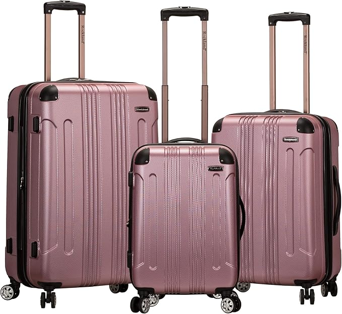 Rockland London Hardside Spinner Wheel Luggage, Pink, 3-Piece Set (20/24/28)